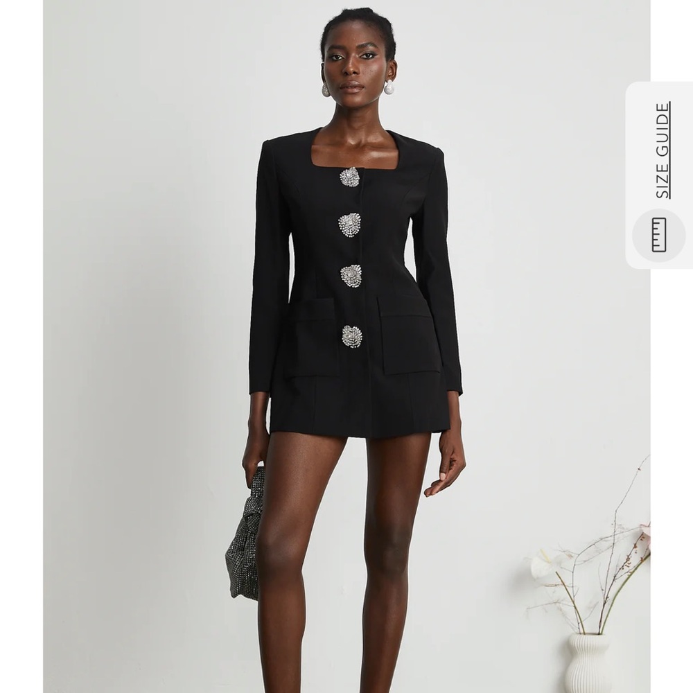 Elegant Black Mini Dress with Statement Buttons